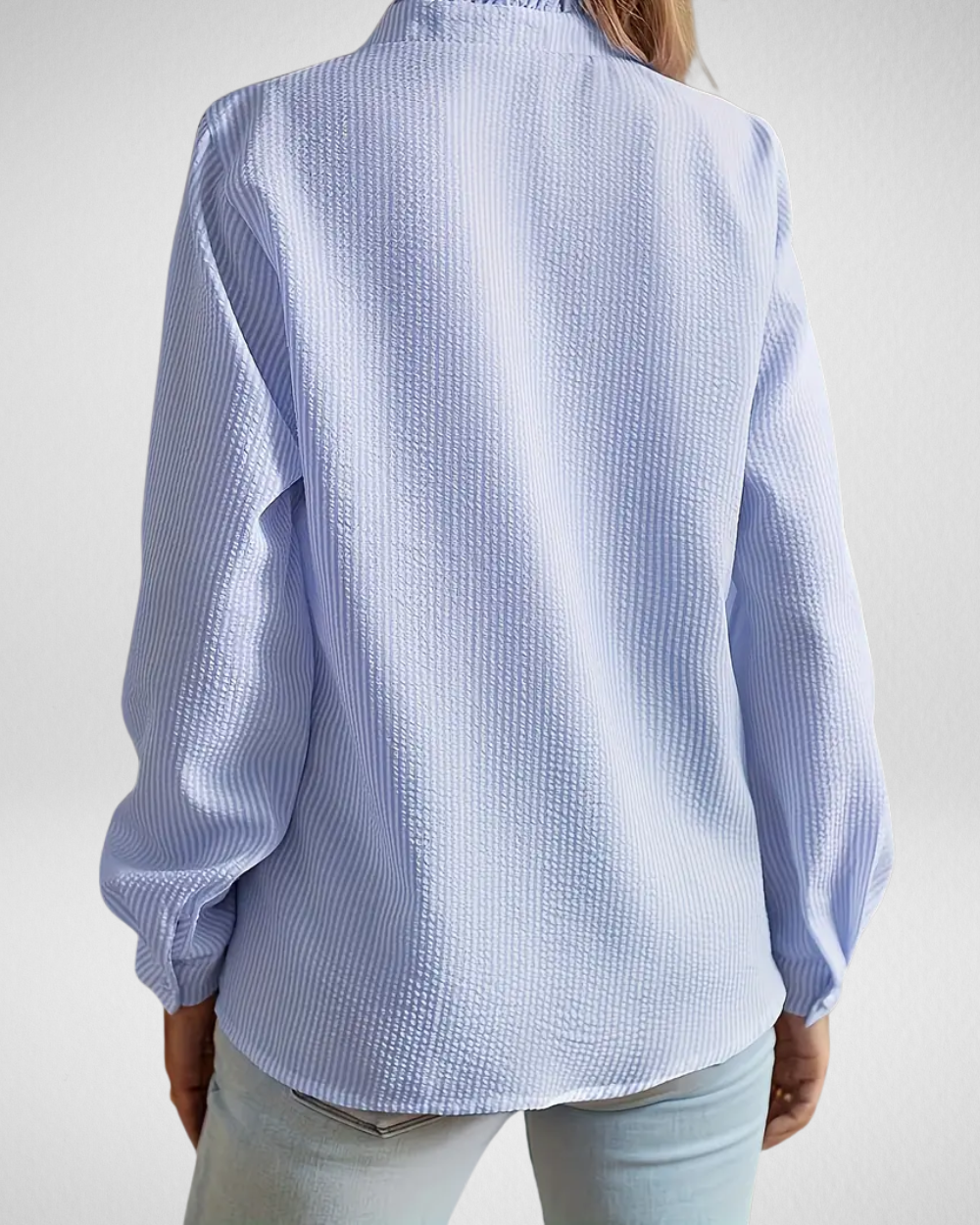 女性用ストライプフリルブラウス（長袖）